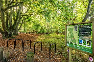 An information board and cycle racks at Broadland Country Park. (Photo by Fisheye)