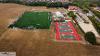 Aerial view of Kett's Park football pitches, tennis and netball courts, looking west. (Photo by Tim Mansfield)