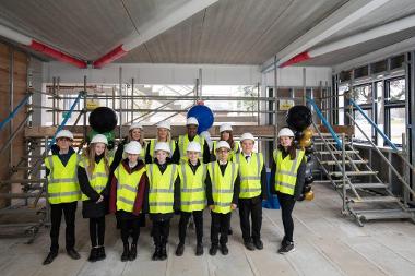Students at the steel beam signing.