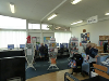 Internal view of Wroxham Library with computer terminals and part of the issue desk.