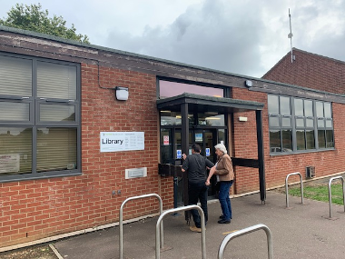 The entrance to Costessey Library with bike racks in the foreground.