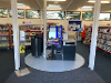 Interior photograph of Costessey Library showing the self-checkout/return facilities.