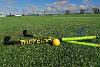 Crossed hockey sticks and a ball lying on the 3G pitch at Aylsham Sports Hub.