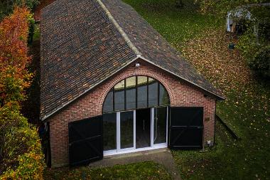 Aerial photograph looking down at the original Yare Boat Club boathouse. (Photo by Fisheye)