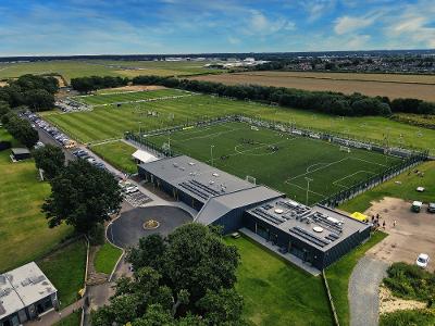 An aerial image of The Nest, showing a football pitch and the supporting facilities.