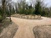 New 3 metre wide path with an open curved corner to increase visibility for users, replacing a small overgrown path.