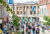 A photograph taken from All Saints Green side, showing the newly pedestrianised Westlegate.