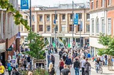 A photograph taken from All Saints Green side, showing the newly pedestrianised Westlegate.