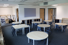 An image of a new classroom at Cringleford Prep Primary School; the image shows various tables with chairs around the outside.
