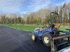 A photograph showing a tractor helping to surface the FDC Bowthorpe 3G Pitch.